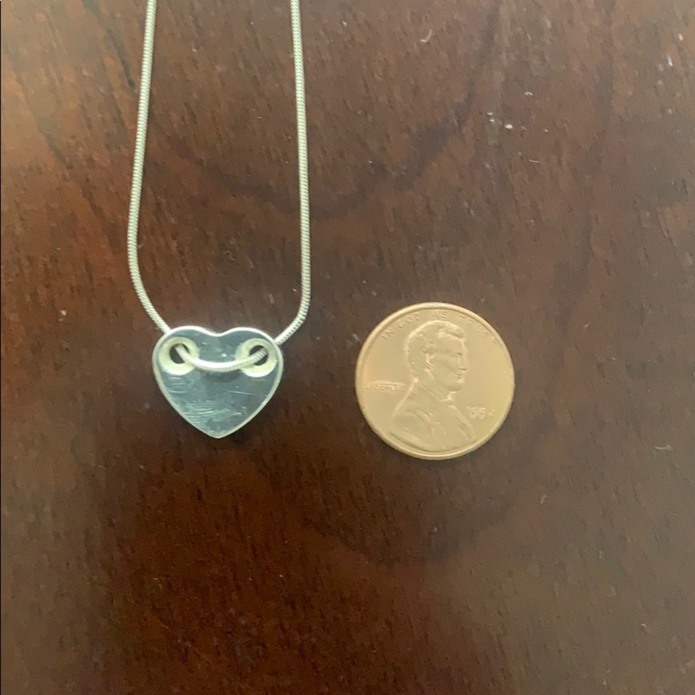 button heart necklace